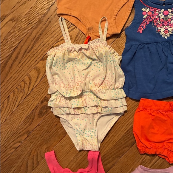 Colorful Baby Clothing Set. Includes Outfits, Tees, Onesies, Leggings, and Dress - Picture 13 of 16